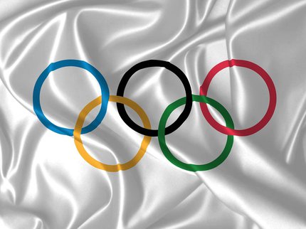 5 coloured rings representing the Olympic Rings on a white background
