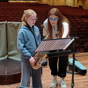 Jess Gillam teaches one on one with a pupil