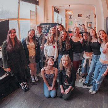 A group of young people smiling