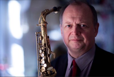 Photograph of Alan Barnes with his saxophone