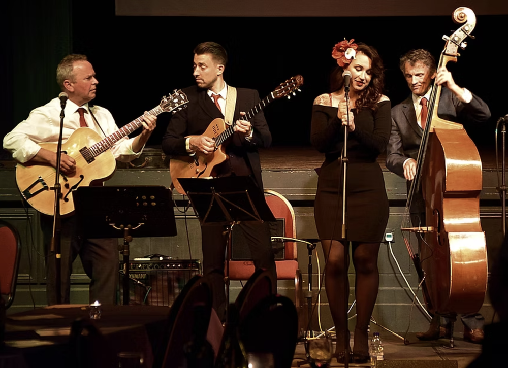 Jazz quartet playing instruments featuring Pat McCarthy and Shannon Reilly