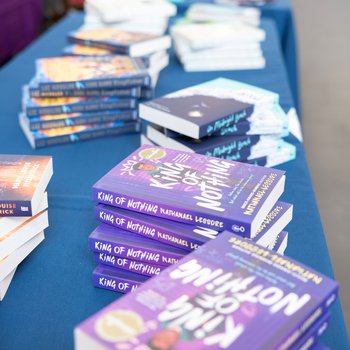 a pile of books on a table