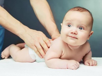 Baby being massaged