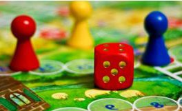 snakes and ladders game board with dice and counter pieces