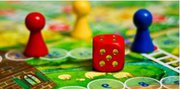 snakes and ladders game board with dice and counter pieces