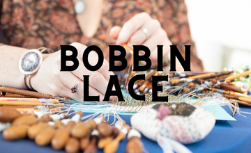 Hands using bobbin