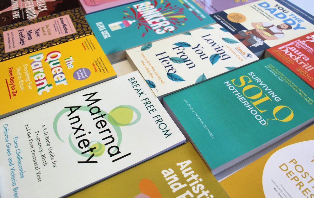 Flatlay of some of the titles included in the Reading Well for families collection
