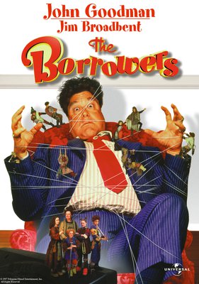 Film poster cover for the Borrowers - a man in a suit is sat in a red chair and tied up with strings held by tiny people
