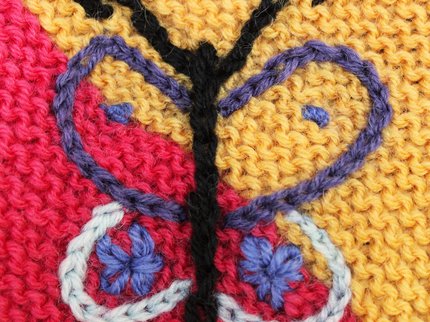 Chain stitch embroidered butterfly motif