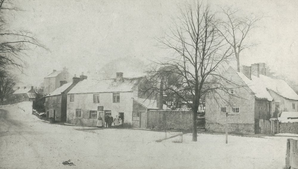 Old black and white image of cottages on the site of the later Skegby Railway Station, 1890.