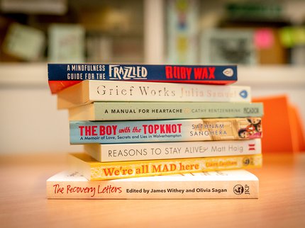 A pile of reading well books