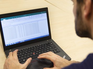 Man sat at laptop