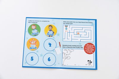 A blue collectors card partially open filled with 3 round stickers, and three numbered empty circles of the left side.  On the right a maze puzzle and space for colouring.