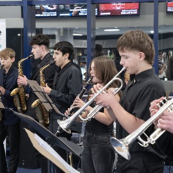 A group of young musician perform in the foyer at Royal Concert Hall