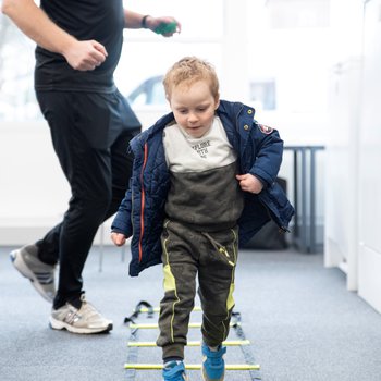 Child taking part in Health Information Week activity