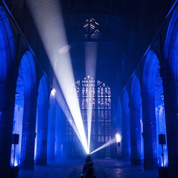 Church interior lit up blue.