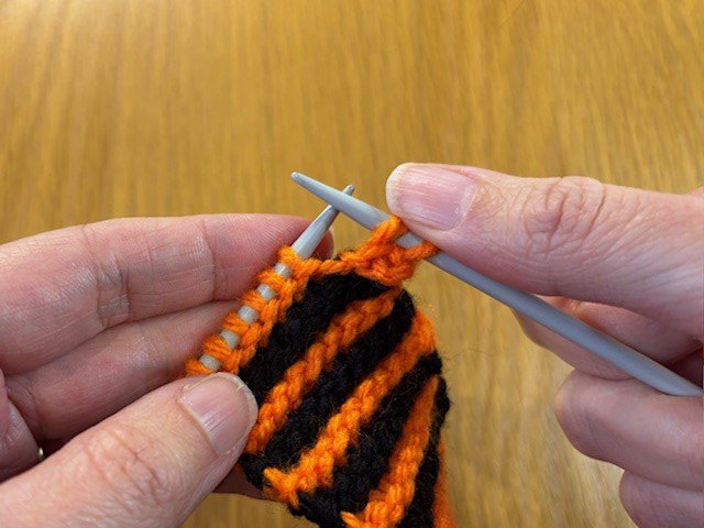 Two stitches on right hand knitting needle