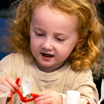 girl doing craft activity