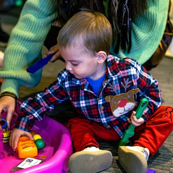 young by playing with toys