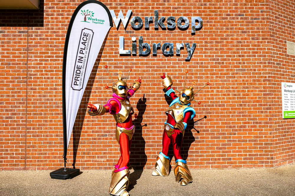 Aliens at Worksop Library with Pride in Place banner