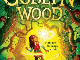 Into Goblyn Wood book cover. A long haired figure stands barefoot looking up at a bright star like object. Surrounded by a yellow glow others look on hidden behind tree trunks. In text 'Fight for the magic within'