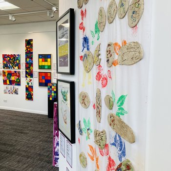 A gallery wall with art