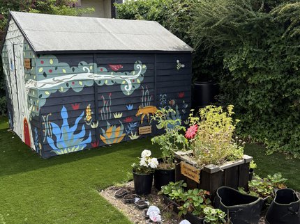 A flower bed vegetable garden at kirkby library