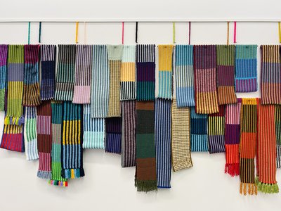 A wall of care squares colourful blankets