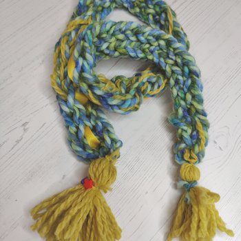 A finger-knit scarf