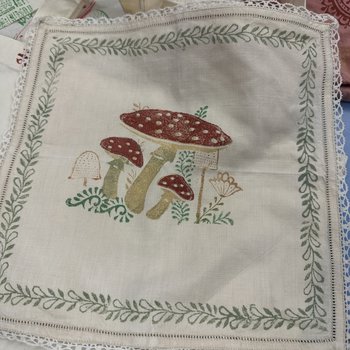 A hand-printed tote bag with a cute mushroom motif