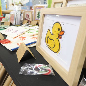 Ink transfer of a duck on a stall