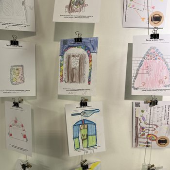 Image of 12 postcards with drawings made by primary school children, displayed at Worksop Library gallery