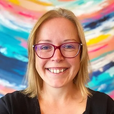 Photo of author Jo Middleton - a white woman with shoulder-length blonde hair and glasses.
