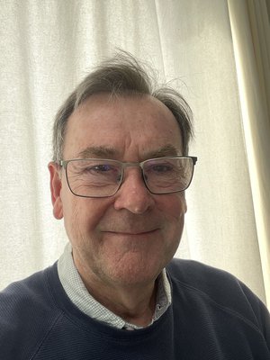 Photo of board member John Hess