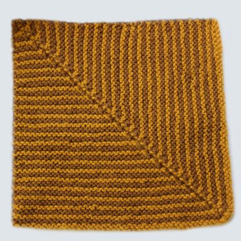 An image of a square made from knitted stitches