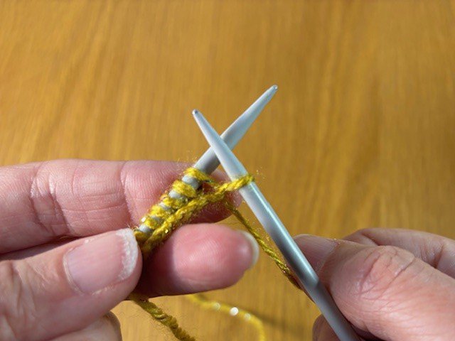 Image of knitting - one stitch on right hand needle