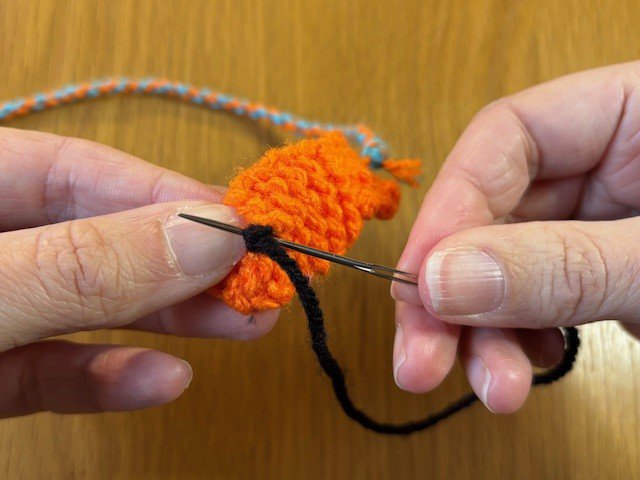 Stitches behind a French knot