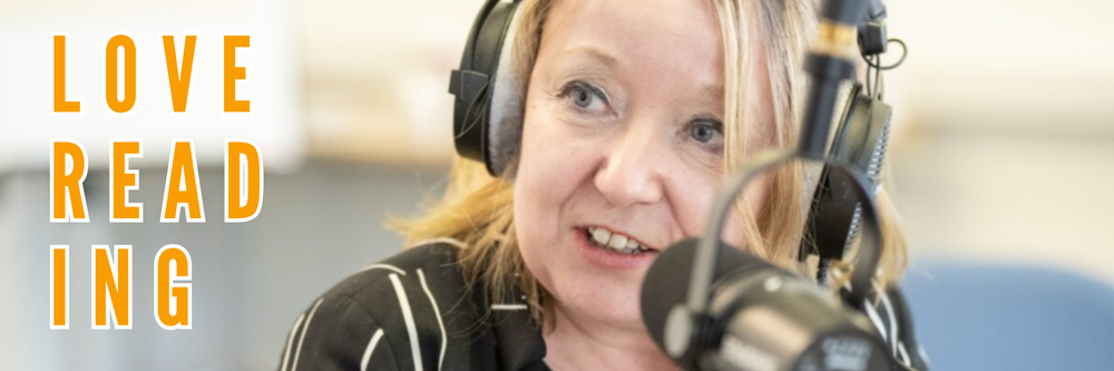 An image of a blonde woman talking into a microphone with text "LOVE READING" on the left