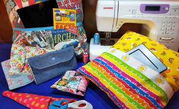 Sewing machine with sewing equipment and cushions