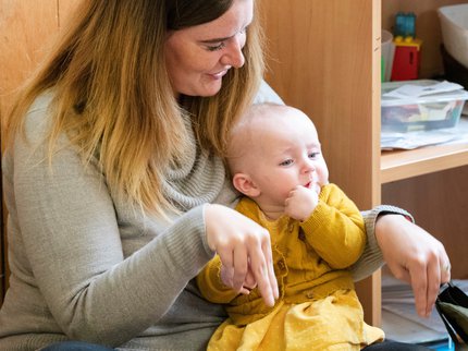 Makaton mum and baby landscape.jpg