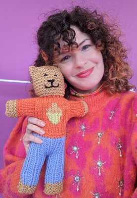 Megan with knitted Brave Bear.jpg