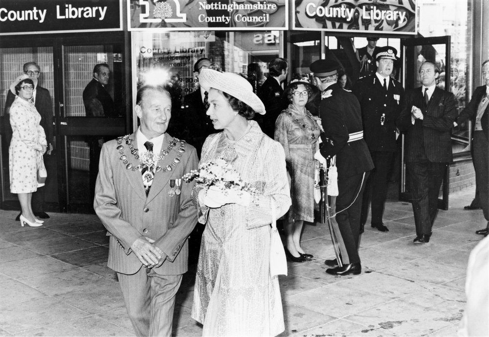 Black and white photograph of the Queen on the day she opened Mansfield Library in 1977