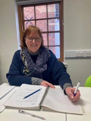 Learner writing poems