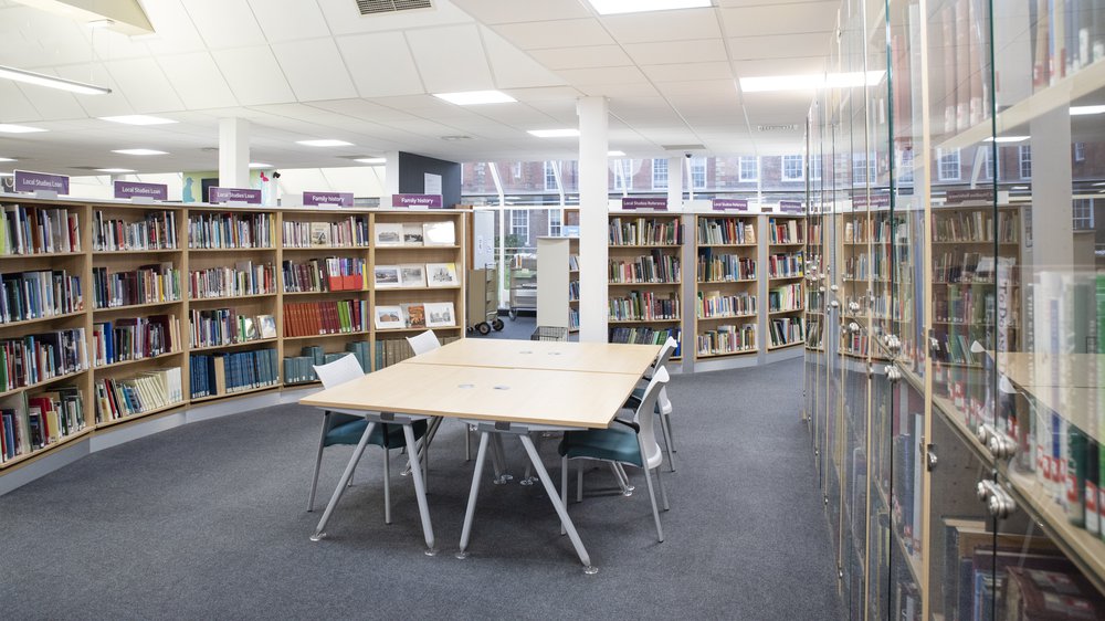 General view of the Local Studies area at Newark Library, showing books on shelves and the study area.