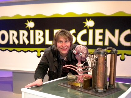 Nick Arnold.TV set image.