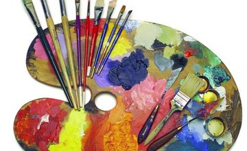 Artist palette with various coliurs, brushes and tools