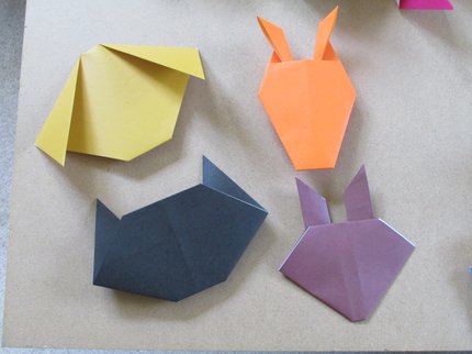 Four paper origami designs, pig, rabbit, cat and fox