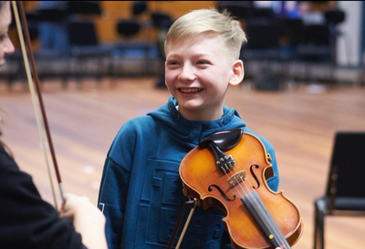 A Furthering Talent student enjoying a orchestra workshop in London