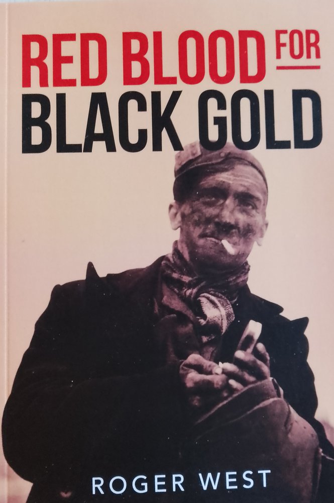 Front cover of Red Blood for Black Gold book showing photograph of miner