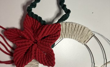 Metal macrame hoop with red Christmas flower